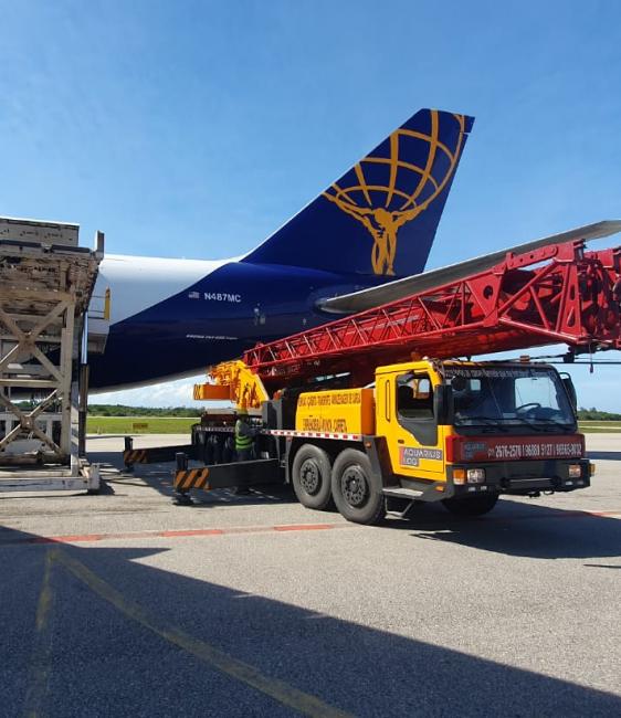 aviation service banner with a man and a woman using a tablet